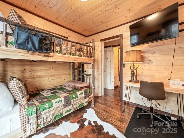 171 Jade Dr, Clyde, NC 28721 - bedroom featuring wood walls, wooden ceiling, and wood-type flooring