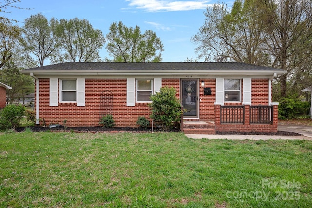 4314 Oak Forest Dr, Charlotte, NC 28215 - single story home featuring a front lawn and brick siding
