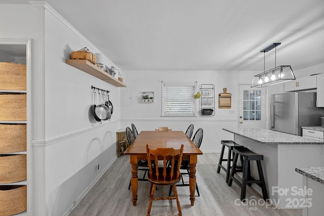 4314 Oak Forest Dr, Charlotte, NC 28215 - dining space with light wood-type flooring