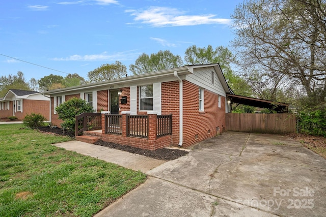 4314 Oak Forest Dr, Charlotte, NC 28215 - view of front of house with crawl space, driveway, fence, a front yard, and brick siding