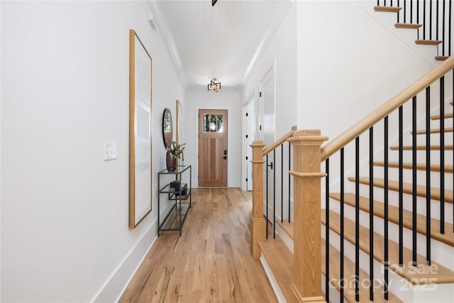 816 Tennyson Dr, Charlotte, NC 28208 - corridor with baseboards, light wood-style flooring, and stairway