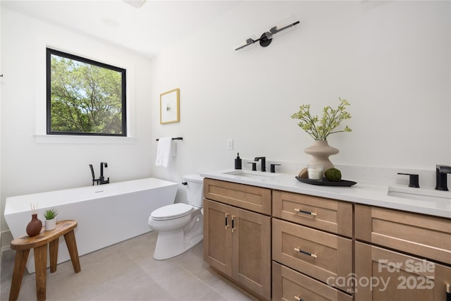 816 Tennyson Dr, Charlotte, NC 28208 - full bath featuring vanity, tile patterned floors, a freestanding bath, and toilet