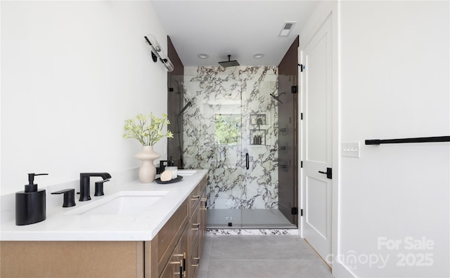 816 Tennyson Dr, Charlotte, NC 28208 - bathroom with a marble finish shower, vanity, tile patterned floors, and visible vents