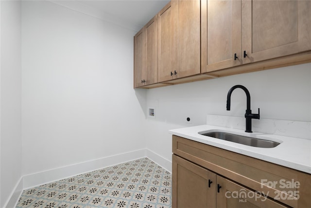 816 Tennyson Dr, Charlotte, NC 28208 - laundry area with cabinet space, washer hookup, a sink, electric dryer hookup, and baseboards