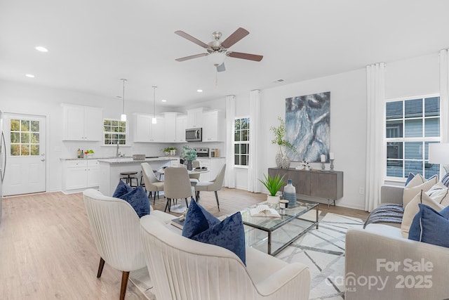 1619 Martin Ave, Gastonia, NC 28052 - living room featuring ceiling fan, light wood-style flooring, and recessed lighting