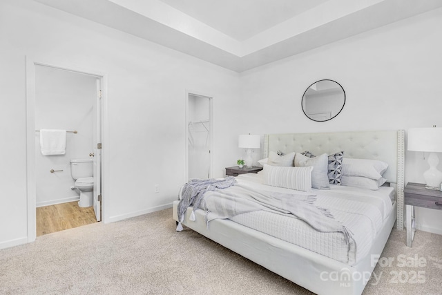 1619 Martin Ave, Gastonia, NC 28052 - carpeted bedroom with a walk in closet, baseboards, ensuite bath, and a closet