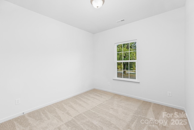1619 Martin Ave, Gastonia, NC 28052 - spare room featuring carpet and baseboards