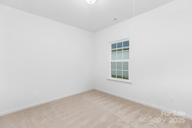 1619 Martin Ave, Gastonia, NC 28052 - spare room featuring carpet floors and baseboards