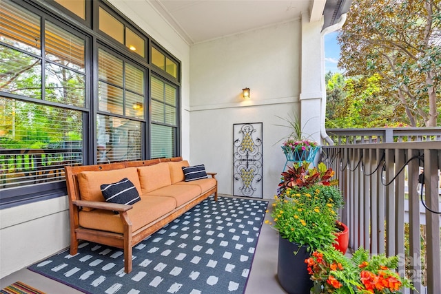 balcony with outdoor lounge area and covered porch