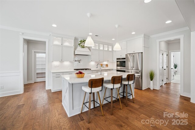 528 Rock Skip Way, Fort Mill, SC 29708 - kitchen featuring stainless steel appliances, custom exhaust hood, tasteful backsplash, light countertops, and white cabinetry