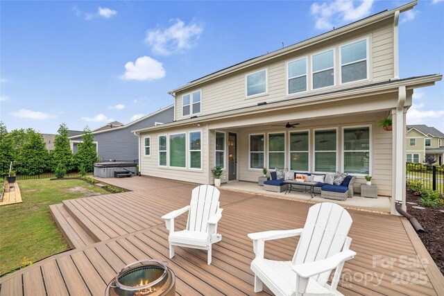 528 Rock Skip Way, Fort Mill, SC 29708 - wooden terrace featuring a hot tub, an outdoor living space with a fire pit, and ceiling fan