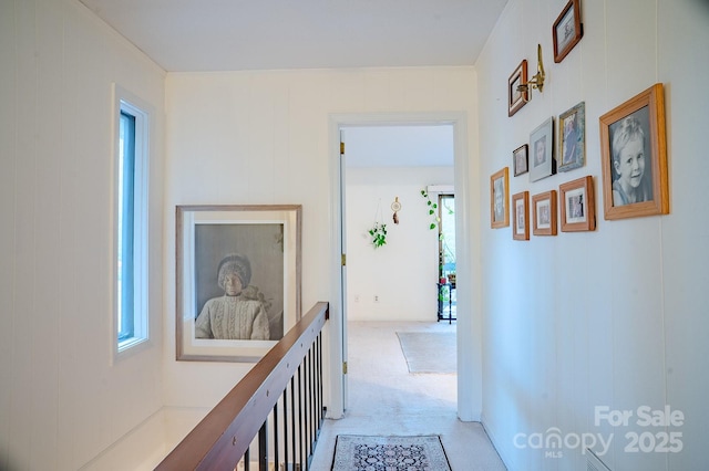 hall with light carpet