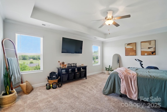4321 Hornyak Dr, Monroe, NC 28110 - carpeted bedroom featuring a tray ceiling, crown molding, baseboards, and ceiling fan