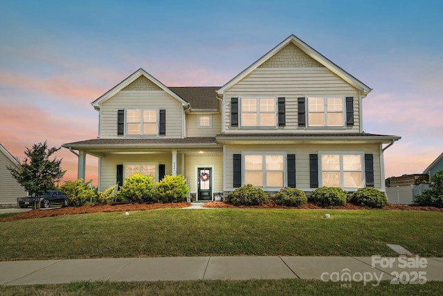4321 Hornyak Dr, Monroe, NC 28110 - traditional-style house featuring a front yard and covered porch