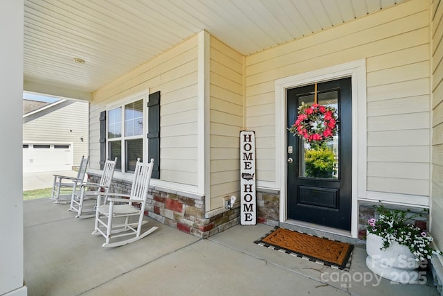 4321 Hornyak Dr, Monroe, NC 28110 - property entrance featuring a porch and a garage