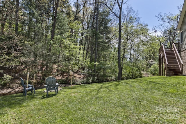 view of yard featuring stairway