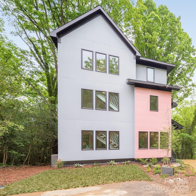 1847 Vinton St, Charlotte, NC 28216 - rear view of house with stucco siding