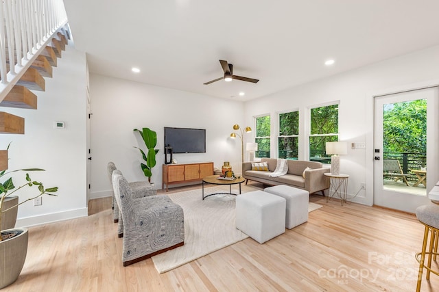 1847 Vinton St, Charlotte, NC 28216 - living area featuring a ceiling fan, baseboards, a healthy amount of sunlight, and wood finished floors