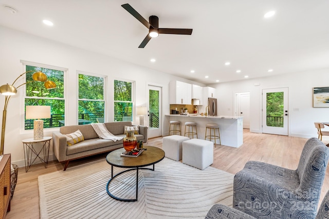 1847 Vinton St, Charlotte, NC 28216 - living area with light wood-type flooring, plenty of natural light, a ceiling fan, and recessed lighting