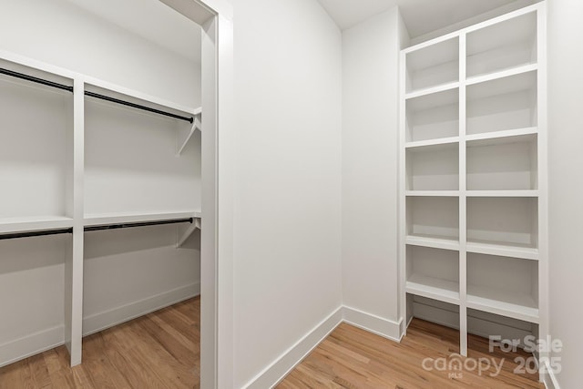 1847 Vinton St, Charlotte, NC 28216 - spacious closet with light wood-style flooring
