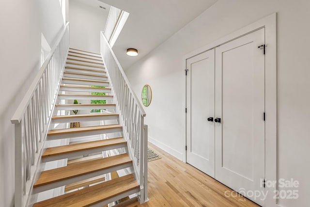 1847 Vinton St, Charlotte, NC 28216 - stairway featuring baseboards and wood finished floors