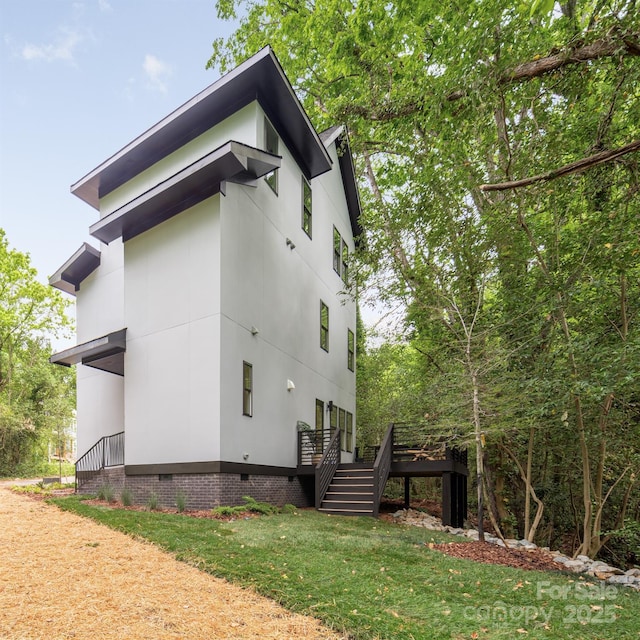 1847 Vinton St, Charlotte, NC 28216 - view of side of home featuring stairway, crawl space, a yard, and a deck