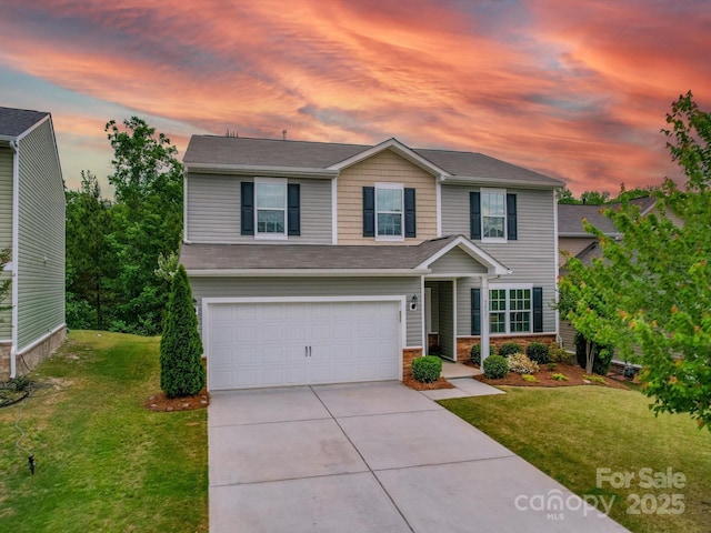 view of front of home featuring an attached garage, a front lawn, stone siding, and concrete driveway