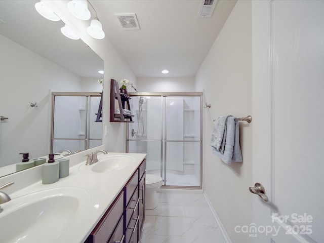 full bath with visible vents, a sink, and a stall shower