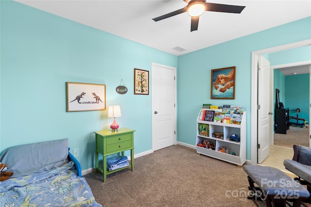 bedroom featuring carpet floors, baseboards, ceiling fan, and visible vents