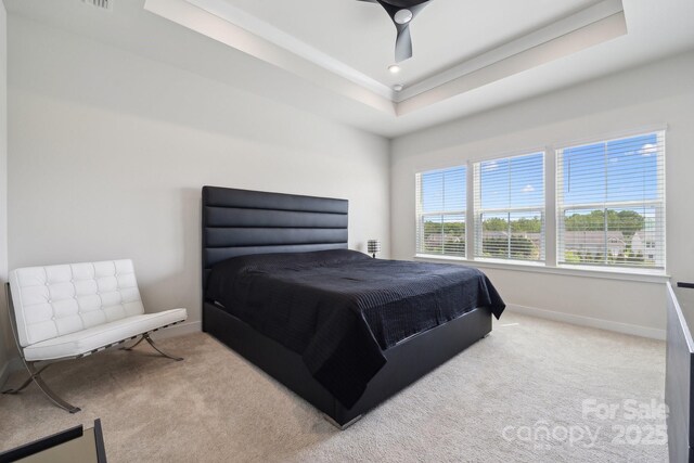 bedroom with recessed lighting, carpet floors, ceiling fan, baseboards, and a raised ceiling