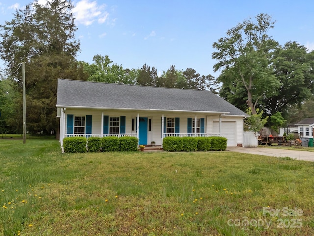 ranch-style house with a front yard, concrete driveway, a garage, and covered porch