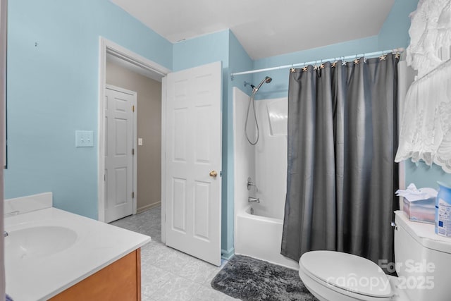 bathroom featuring toilet, tile patterned floors, shower / bath combo with shower curtain, and vanity