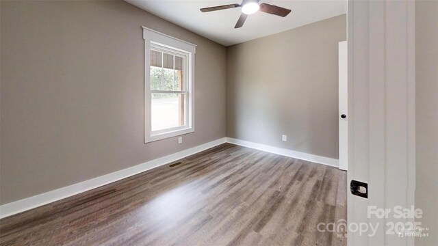 108 Big Hill Rd, Lawndale, NC 28090 - empty room featuring dark wood-style flooring, a ceiling fan, and baseboards