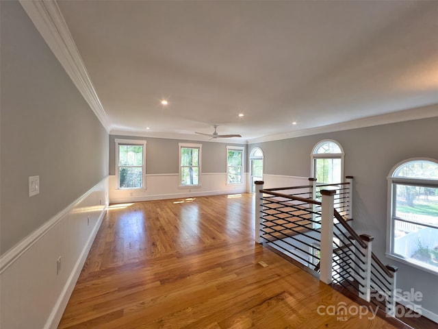 484 Chisholm Trl, Rutherfordton, NC 28139 - interior space with ornamental molding, a ceiling fan, wood finished floors, and plenty of natural light