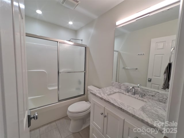 484 Chisholm Trl, Rutherfordton, NC 28139 - full bathroom with recessed lighting, shower / bath combination with glass door, toilet, vanity, and visible vents