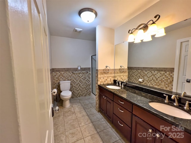 484 Chisholm Trl, Rutherfordton, NC 28139 - full bath with toilet, tile patterned flooring, a sink, and tile walls
