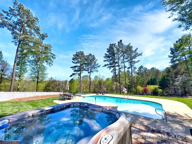 484 Chisholm Trl, Rutherfordton, NC 28139 - view of pool with a lawn, fence, a fenced in pool, and a hot tub