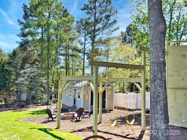 484 Chisholm Trl, Rutherfordton, NC 28139 - view of yard featuring fence and an outdoor fire pit