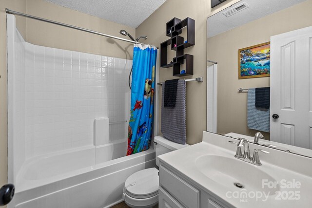 full bath featuring vanity, shower / tub combo with curtain, toilet, a textured ceiling, and visible vents