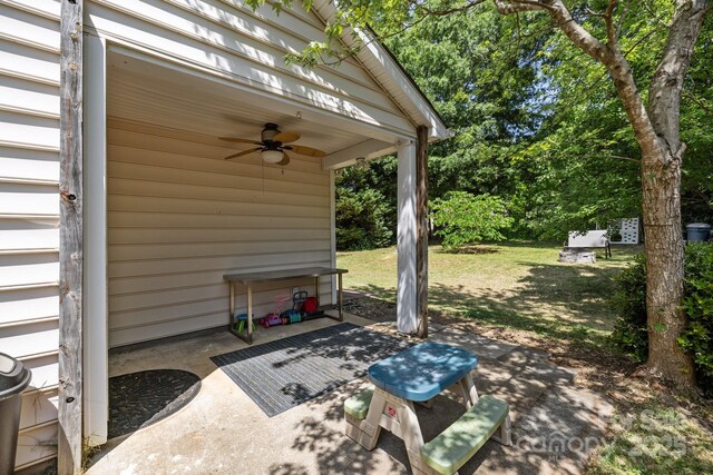 view of patio / terrace featuring ceiling fan