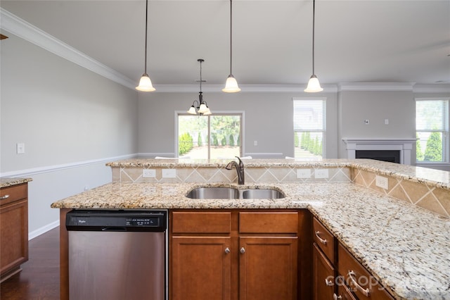 kitchen featuring light stone counters, a sink, brown cabinetry, stainless steel dishwasher, and ornamental molding