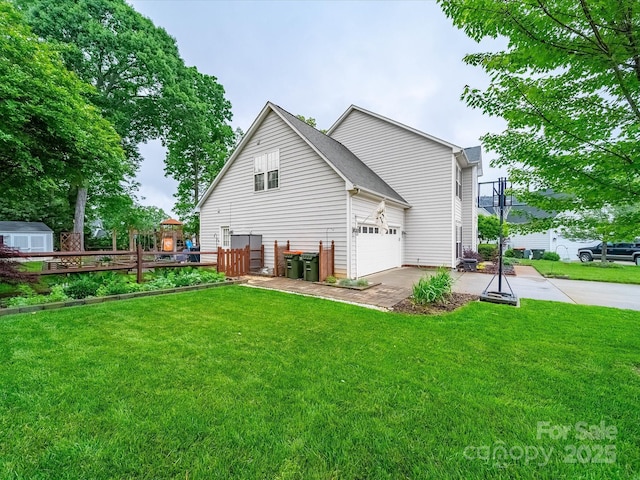 view of home's exterior with driveway and a yard