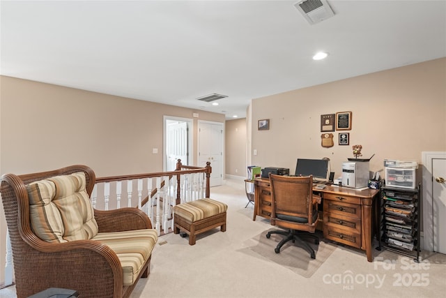 office with recessed lighting, visible vents, and light carpet