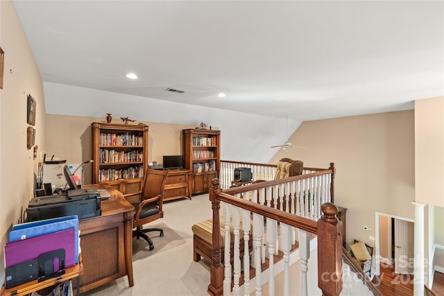 office space featuring recessed lighting, ceiling fan, visible vents, and light carpet