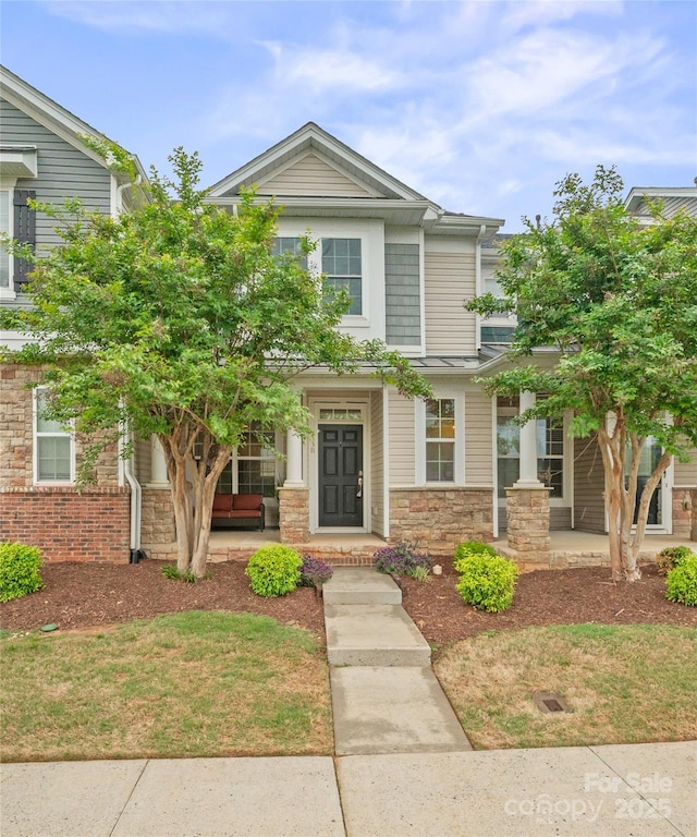 233 E Waterlynn Rd Unit B, Mooresville, NC 28117 - view of front facade featuring a porch and stone siding