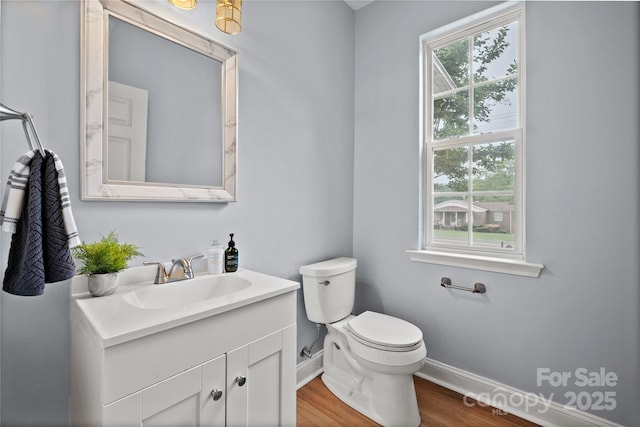 233 E Waterlynn Rd Unit B, Mooresville, NC 28117 - half bathroom featuring vanity and wood finished floors