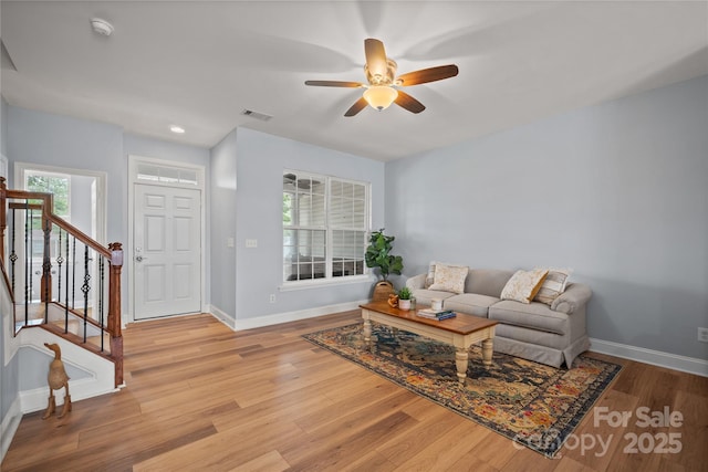 233 E Waterlynn Rd Unit B, Mooresville, NC 28117 - living area featuring ceiling fan, light wood finished floors, stairway, and recessed lighting