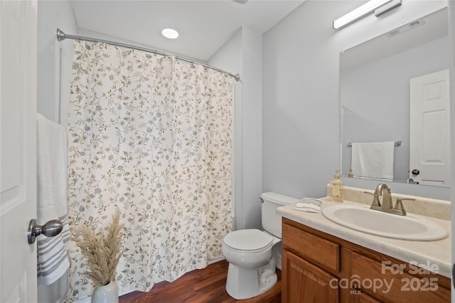 233 E Waterlynn Rd Unit B, Mooresville, NC 28117 - full bathroom with wood finished floors, vanity, and a shower with curtain