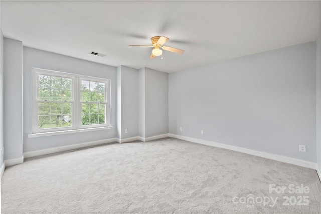 233 E Waterlynn Rd Unit B, Mooresville, NC 28117 - carpeted spare room featuring a ceiling fan and baseboards