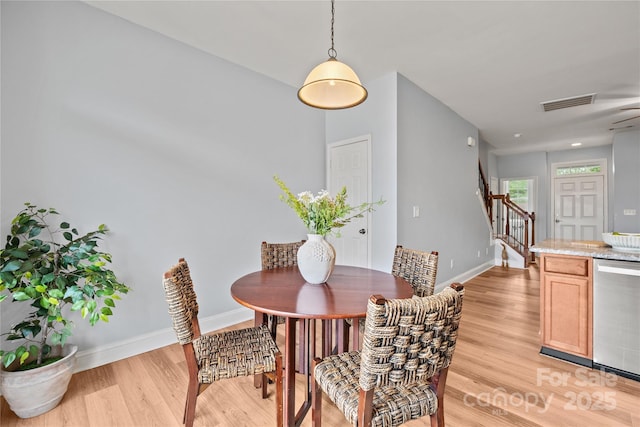 233 E Waterlynn Rd Unit B, Mooresville, NC 28117 - dining area with stairway and light wood-type flooring